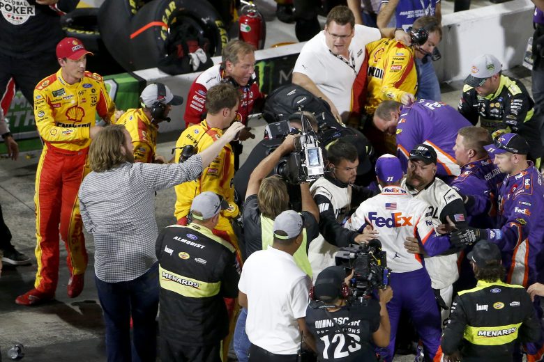 MARTINSVILLE, VIRGINIA - OCTOBER 27: Denny Hamlin, driver of the #11 FedEx Freight Toyota, Joey Logano, driver of the #22 Shell Pennzoil Ford, and their crews have an altercation on pit lane following the Monster Energy NASCAR Cup Series First Data 500 at Martinsville Speedway on October 27, 2019 in Martinsville, Virginia. (Photo by Brian Lawdermilk/Getty Images) | Getty Images