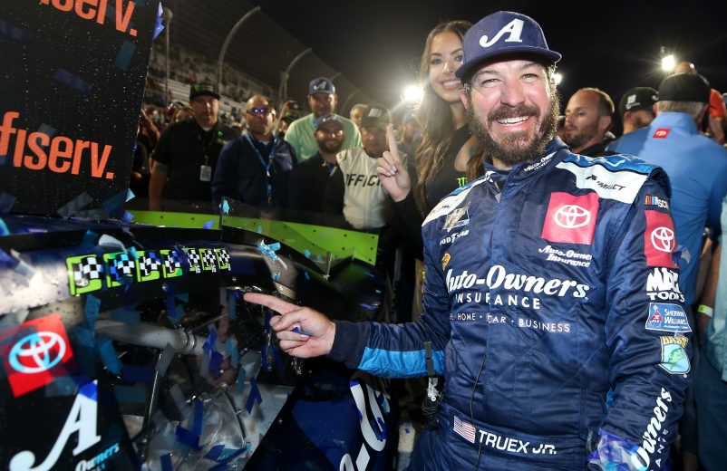 MARTINSVILLE, VIRGINIA - OCTOBER 27: Martin Truex Jr, driver of the #19 Auto Owners Insurance Toyota, poses with the winner's decal on his car in Victory Lane after winning the Monster Energy NASCAR Cup Series First Data 500 at Martinsville Speedway on October 27, 2019 in Martinsville, Virginia. (Photo by Matt Sullivan/Getty Images) | Getty Images