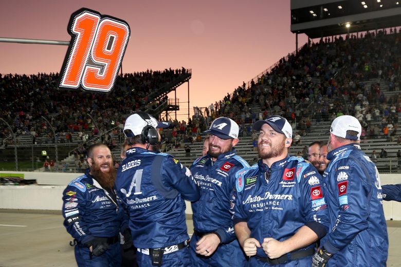 MARTINSVILLE, VIRGINIA - OCTOBER 27: The crew of Martin Truex Jr, driver of the #19 Auto Owners Insurance Toyota, celebrate on pit lane after winning the Monster Energy NASCAR Cup Series First Data 500 at Martinsville Speedway on October 27, 2019 in Martinsville, Virginia. (Photo by Matt Sullivan/Getty Images) | Getty Images