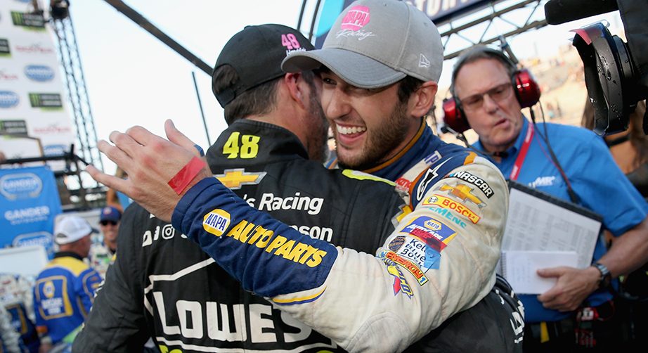 DOVER, DE - OCTOBER 07: Chase Elliott, driver of the #9 NAPA Auto Parts Chevrolet, is congratulated by Jimmie Johnson, driver of the #48 Lowe's for Pros Chevrolet, in Victory Lane after winning the Monster Energy NASCAR Cup Series Gander Outdoors 400 at Dover International Speedway on October 7, 2018 in Dover, Delaware. (Photo by Brian Lawdermilk/Getty Images) | Getty Images