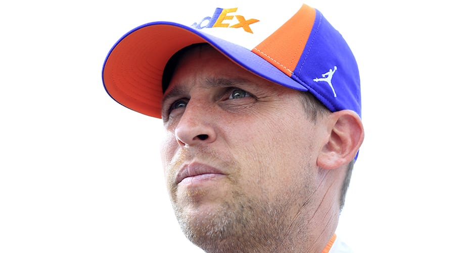 LOUDON, NEW HAMPSHIRE - JULY 19: Denny Hamlin, driver of the #11 FedEx Express Toyota, looks on during qualifying for the Monster Energy NASCAR Cup Series Foxwoods Resort Casino 301 at New Hampshire Motor Speedway on July 19, 2019 in Loudon, New Hampshire. (Photo by Chris Trotman/Getty Images) | Getty Images