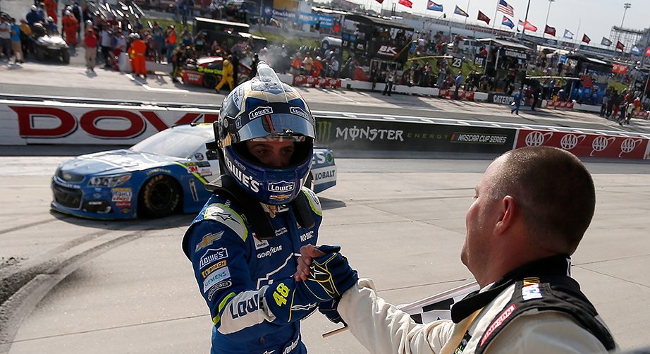 DOVER, DE - JUNE 04: Jimmie Johnson, driver of the #48 Lowe's Chevrolet, celebrates with NASCAR official Corey Richardson after winning the Monster Energy NASCAR Cup Series AAA 400 Drive for Autism at Dover International Speedway on June 4, 2017 in Dover, Delaware. (Photo by Matt Hazlett/Getty Images) | Getty Images