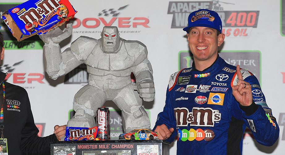 DOVER, DE - OCTOBER 01: Kyle Busch, driver of the #18 M&M's Caramel Toyota, poses with the trophy in Victory Lane after winning the Monster Energy NASCAR Cup Series Apache Warrior 400 presented by Lucas Oil at Dover International Speedway on October 1, 2017 in Dover, Delaware. (Photo by Chris Trotman/Getty Images) | Getty Images