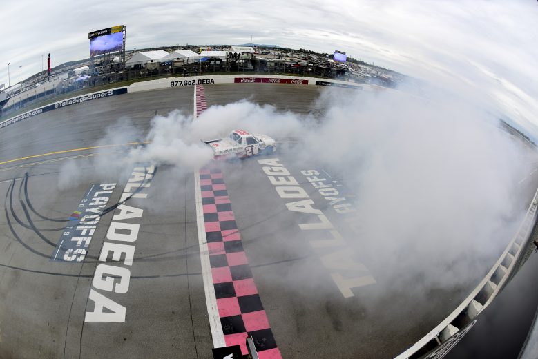 TALLADEGA, ALABAMA - OCTOBER 12: Spencer Boyd, driver of the #20 Alabama Roofing Professionals Chevrolet, celebrates with a burnout after winning the NASCAR Gander Outdoor Truck Series Sugarlands Shine 250 at Talladega Superspeedway on October 12, 2019 in Talladega, Alabama. (Photo by Jared C. Tilton/Getty Images) | Getty Images