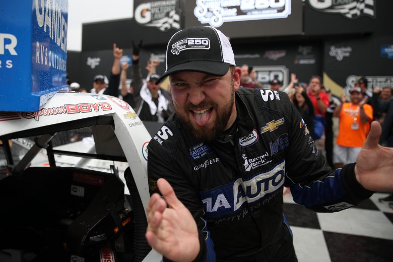 TALLADEGA, ALABAMA - OCTOBER 12: Spencer Boyd, driver of the #20 Alabama Roofing Professionals Chevrolet, celebrates in victory lane after winning the NASCAR Gander Outdoor Truck Series Sugarlands Shine 250 at Talladega Superspeedway on October 12, 2019 in Talladega, Alabama. (Photo by Chris Graythen/Getty Images) | Getty Images