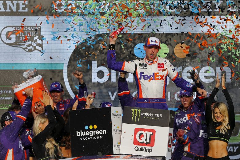 AVONDALE, ARIZONA - NOVEMBER 10: Denny Hamlin, driver of the #11 FedEx Ground Toyota, celebrates in Victory Lane after winning the Monster Energy NASCAR Cup Series Bluegreen Vacations 500 at ISM Raceway on November 10, 2019 in Avondale, Arizona. (Photo by Jonathan Ferrey/Getty Images) | Getty Images