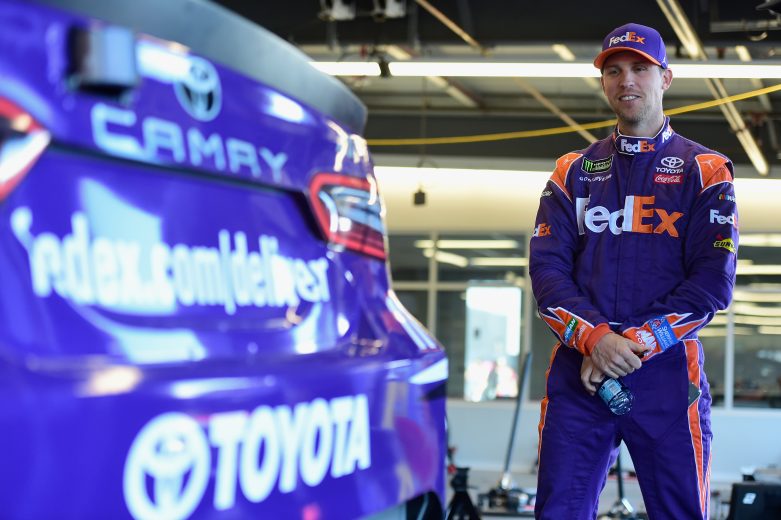 PHOENIX, AZ - NOVEMBER 09:  Denny Hamlin, driver of the #11 FedEx Ground Toyota, stands in the garage area during practice for the Monster Energy NASCAR Cup Series Can-Am 500 at ISM Raceway on November 9, 2018 in Phoenix, Arizona.  (Photo by Jared C. Tilton/Getty Images) | Getty Images