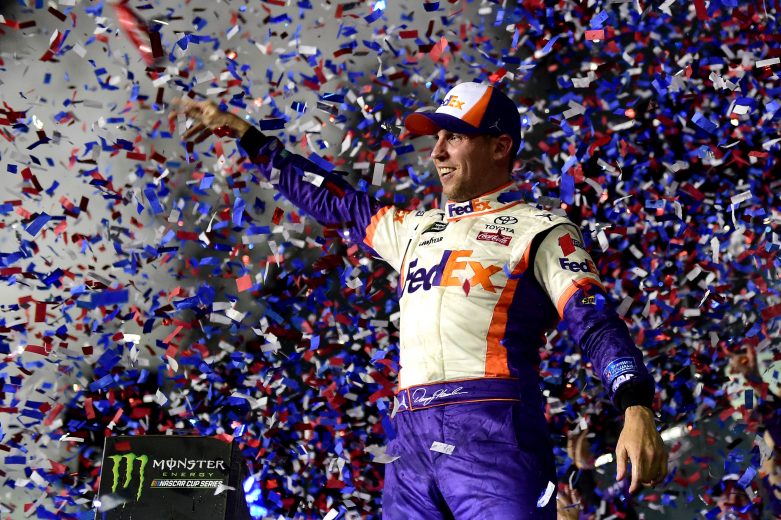 DAYTONA BEACH, FL - FEBRUARY 17: Denny Hamlin, driver of the #11 FedEx Express Toyota, celebrates in victory lane after winning the Monster Energy NASCAR Cup Series 61st Annual Daytona 500 at Daytona International Speedway on February 17, 2019 in Daytona Beach, Florida. (Photo by Jared C. Tilton/Getty Images) | Getty Images