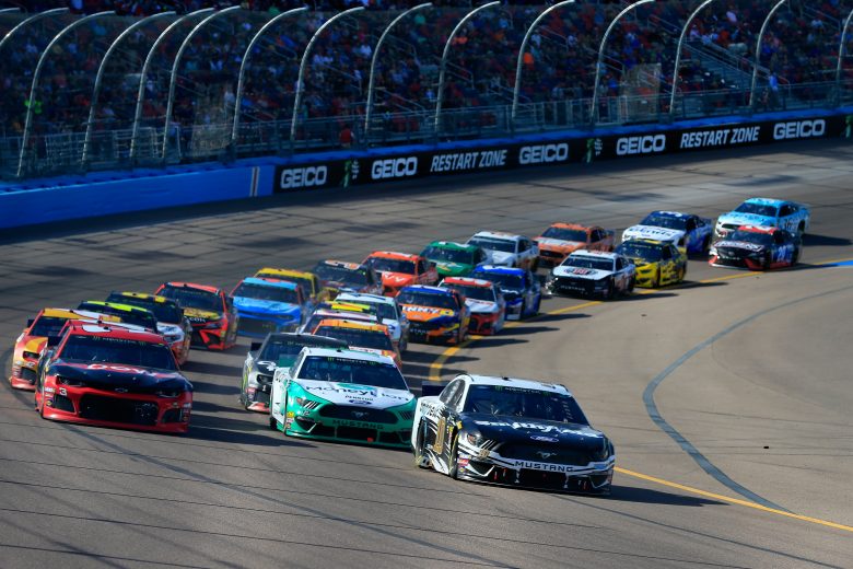 AVONDALE, AZ - MARCH 10: Aric Almirola, driver of the #10 Smithfield Ford, leads the field in a restart during the Monster Energy NASCAR Cup Series TicketGuardian 500 at ISM Raceway on March 10, 2019 in Avondale, Arizona. (Photo by Daniel Shirey/Getty Images) | Getty Images
