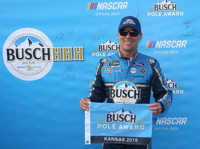KANSAS CITY, KS - MAY 10: Kevin Harvick, driver of the #4 Busch Beer Ford, poses with the Pole Award following qualifying for the Monster Energy NASCAR Cup Series Digital Ally 400 at Kansas Speedway on May 10, 2019 in Kansas City, Kansas. (Photo by Brian Lawdermilk/Getty Images) | Getty Images