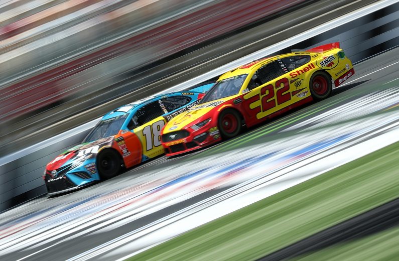 CHARLOTTE, NC - MAY 17: Kyle Busch, driver of the #18 M&M's Hazelnut Toyota, and Joey Logano, driver of the #22 Shell Pennzoil Ford, practice for the Monster Energy NASCAR Cup Series All-Star Race and the Monster Energy NASCAR Cup Series Open Race at Charlotte Motor Speedway on May 17, 2019 in Charlotte, North Carolina. (Photo by Streeter Lecka/Getty Images) | Getty Images