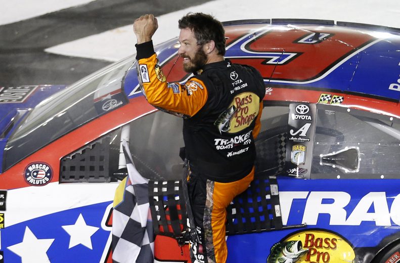 CHARLOTTE, NORTH CAROLINA - MAY 26: Martin Truex Jr., driver of the #19 Bass Pro Shops/TRACKER/USO Toyota, celebrates after winning the Monster Energy NASCAR Cup Series Coca-Cola 600 at Charlotte Motor Speedway on May 26, 2019 in Charlotte, North Carolina. (Photo by Brian Lawdermilk/Getty Images) | Getty Images