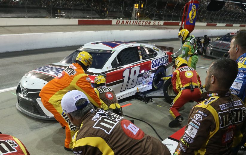 DARLINGTON, SOUTH CAROLINA - SEPTEMBER 01: Kyle Busch, driver of the #18 Snickers Throwback Toyota, pits during the Monster Energy NASCAR Cup Series Bojangles' Southern 500 at Darlington Raceway on September 01, 2019 in Darlington, South Carolina. (Photo by Brian Lawdermilk/Getty Images) | Getty Images