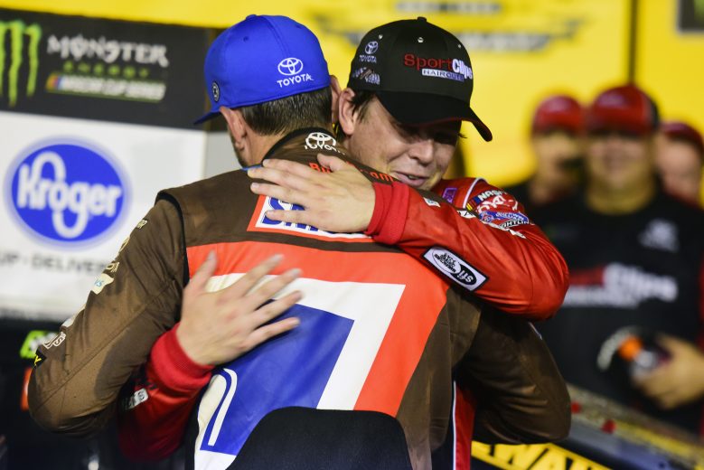 DARLINGTON, SOUTH CAROLINA - SEPTEMBER 02: Erik Jones, driver of the #20 Sport Clips Throwback Toyota, is congratulated by Kyle Busch, driver of the #18 Snickers Throwback Toyota, in Victory Lane after winning the Monster Energy NASCAR Cup Series Bojangles' Southern 500 at Darlington Raceway on September 02, 2019 in Darlington, South Carolina. (Photo by Jared C. Tilton/Getty Images) | Getty Images