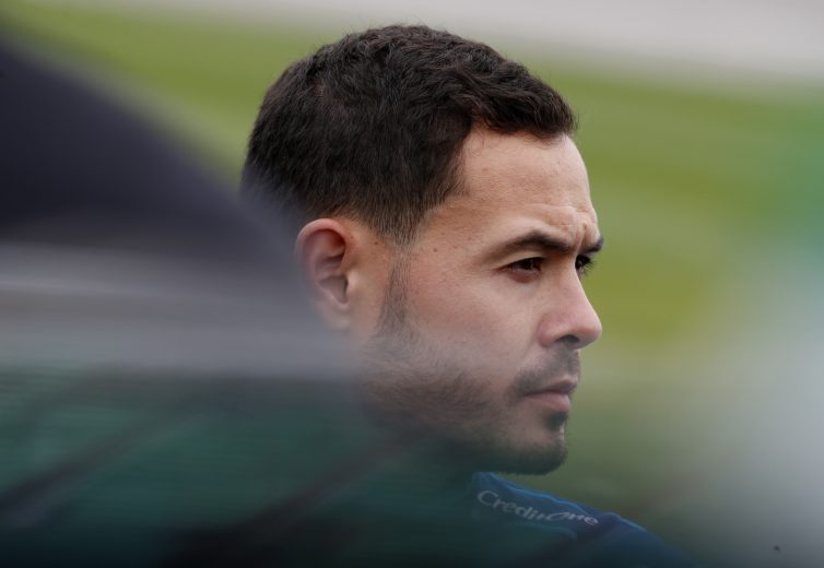 KANSAS CITY, KANSAS - OCTOBER 19: Kyle Larson, driver of the #42 Credit One Bank Chevrolet, waits during qualifying for the Monster Energy NASCAR Cup Series Hollywood Casino 400 at Kansas Speedway on October 19, 2019 in Kansas City, Kansas. (Photo by Brian Lawdermilk/Getty Images) | Getty Images