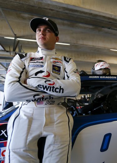 FORT WORTH, TEXAS - NOVEMBER 01: Noah Gragson, driver of the #9 Cessna/Southern Tire Mart Chevrolet, stands in the garage area during practice for the NASCAR Xfinity Series O'Reilly 300 at Texas Motor Speedway on November 01, 2019 in Fort Worth, Texas. (Photo by Jonathan Ferrey/Getty Images) | Getty Images