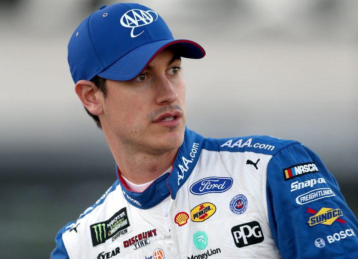 FORT WORTH, TEXAS - NOVEMBER 02: Joey Logano, driver of the #22 AAA Insurance Ford, stands on the grid during the Salute to Veterans Qualifying Day Fueled by The Texas Lottery for the Monster Energy NASCAR Cup Series AAA Texas 500 at Texas Motor Speedway on November 02, 2019 in Fort Worth, Texas. (Photo by Brian Lawdermilk/Getty Images) | Getty Images