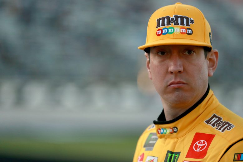 FORT WORTH, TEXAS - NOVEMBER 02: Kyle Busch, driver of the #18 M&M's Toyota, stands on the grid during the Salute to Veterans Qualifying Day Fueled by The Texas Lottery for the Monster Energy NASCAR Cup Series AAA Texas 500 at Texas Motor Speedway on November 02, 2019 in Fort Worth, Texas. (Photo by Sean Gardner/Getty Images) | Getty Images