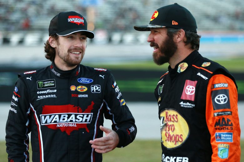 FORT WORTH, TEXAS - NOVEMBER 02: Ryan Blaney, driver of the #12 Wabash National Ford, and Martin Truex Jr., driver of the #19 Bass Pro Shops Toyota, speak on the grid during the Salute to Veterans Qualifying Day Fueled by The Texas Lottery for the Monster Energy NASCAR Cup Series AAA Texas 500 at Texas Motor Speedway on November 02, 2019 in Fort Worth, Texas. (Photo by Sean Gardner/Getty Images) | Getty Images