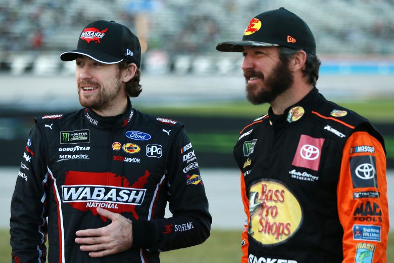FORT WORTH, TEXAS - NOVEMBER 02: Ryan Blaney, driver of the #12 Wabash National Ford, and Martin Truex Jr., driver of the #19 Bass Pro Shops Toyota, speak on the grid during the Salute to Veterans Qualifying Day Fueled by The Texas Lottery for the Monster Energy NASCAR Cup Series AAA Texas 500 at Texas Motor Speedway on November 02, 2019 in Fort Worth, Texas. (Photo by Sean Gardner/Getty Images) | Getty Images