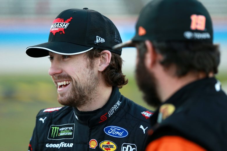 FORT WORTH, TEXAS - NOVEMBER 02: Ryan Blaney, driver of the #12 Wabash National Ford, and Martin Truex Jr., driver of the #19 Bass Pro Shops Toyota, speak on the grid during the Salute to Veterans Qualifying Day Fueled by The Texas Lottery for the Monster Energy NASCAR Cup Series AAA Texas 500 at Texas Motor Speedway on November 02, 2019 in Fort Worth, Texas. (Photo by Sean Gardner/Getty Images) | Getty Images