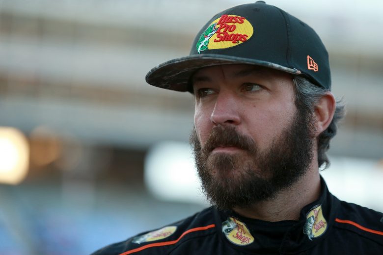 FORT WORTH, TEXAS - NOVEMBER 02: Martin Truex Jr., driver of the #19 Bass Pro Shops Toyota, stands on the grid during the Salute to Veterans Qualifying Day Fueled by The Texas Lottery for the Monster Energy NASCAR Cup Series AAA Texas 500 at Texas Motor Speedway on November 02, 2019 in Fort Worth, Texas. (Photo by Sean Gardner/Getty Images) | Getty Images