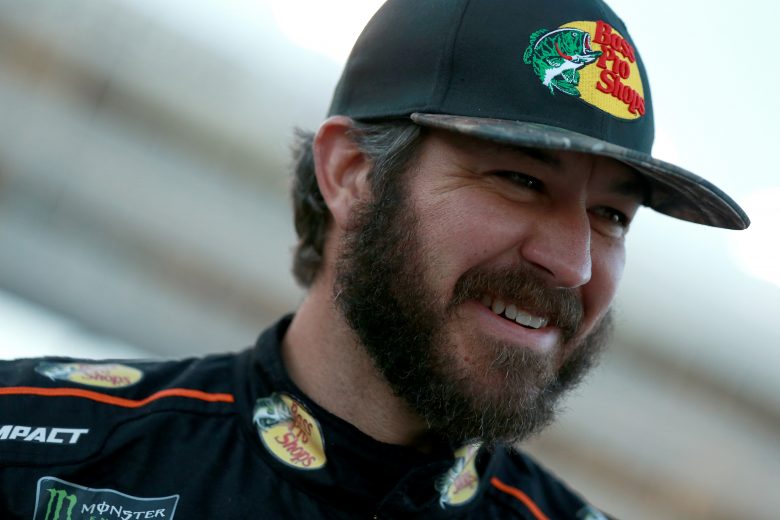 FORT WORTH, TEXAS - NOVEMBER 02: Martin Truex Jr., driver of the #19 Bass Pro Shops Toyota, stands on the grid during the Salute to Veterans Qualifying Day Fueled by The Texas Lottery for the Monster Energy NASCAR Cup Series AAA Texas 500 at Texas Motor Speedway on November 02, 2019 in Fort Worth, Texas. (Photo by Sean Gardner/Getty Images) | Getty Images