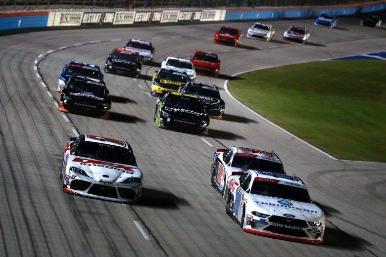 FORT WORTH, TEXAS - NOVEMBER 02: Cole Custer, driver of the #00 Thompson Pipe Group Ford, and Harrison Burton, driver of the #18 DEX Imaging Toyota, lead a pack of cars during the NASCAR Xfinity Series O'Reilly Auto Parts 300 at Texas Motor Speedway on November 02, 2019 in Fort Worth, Texas. (Photo by Sean Gardner/Getty Images) | Getty Images