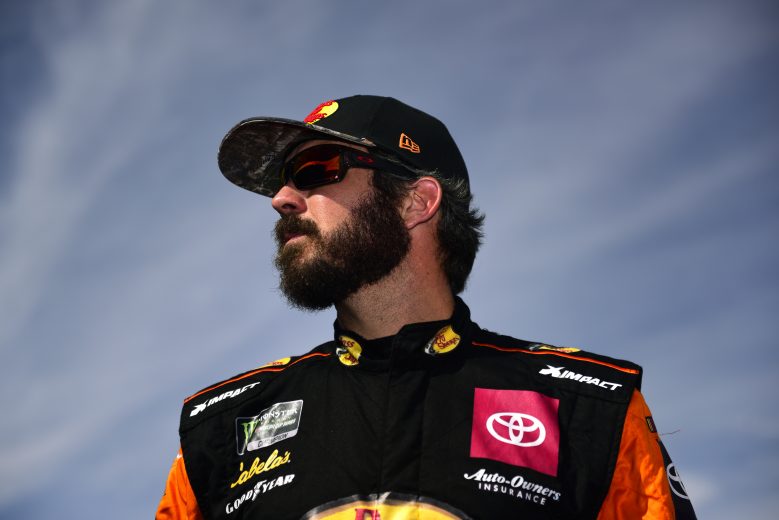 AVONDALE, ARIZONA - NOVEMBER 09: Martin Truex Jr., driver of the #19 Bass Pro Shops Toyota, stands on the grid during qualifying for the Monster Energy NASCAR Cup Series Bluegreen Vacations 500 at ISM Raceway on November 09, 2019 in Avondale, Arizona. (Photo by Jared C. Tilton/Getty Images) | Getty Images