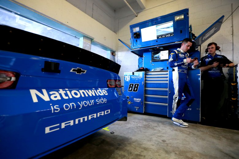 HOMESTEAD, FLORIDA - NOVEMBER 15: Alex Bowman, driver of the #88 Nationwide Chevrolet, stands in the garage during practice for the Monster Energy NASCAR Cup Series Ford EcoBoost 400 at Homestead-Miami Speedway on November 15, 2019 in Homestead, Florida. (Photo by Sean Gardner/Getty Images) | Getty Images