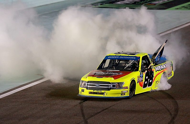 HOMESTEAD, FLORIDA - NOVEMBER 15: Matt Crafton, driver of the #88 Jack Links/Menards Ford, celebrates with a burnout after winning the NASCAR Gander Outdoors Truck Series Ford EcoBoost 200 at Homestead-Miami Speedway on November 15, 2019 in Homestead, Florida. (Photo by Sean Gardner/Getty Images) | Getty Images