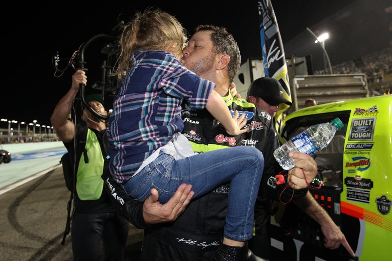 HOMESTEAD, FLORIDA - NOVEMBER 15: Matt Crafton, driver of the #88 Jack Links/Menards Ford, poses with his daughter, Elladee, after winning the NASCAR Gander Outdoors Truck Series Ford Championship at Homestead-Miami Speedway on November 15, 2019 in Homestead, Florida. (Photo by Chris Graythen/Getty Images) | Getty Images