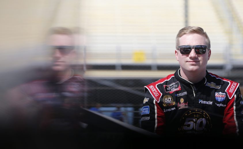 HOMESTEAD, FLORIDA - NOVEMBER 16: Tyler Reddick, driver of the #2 Tame the Beast Chevrolet, stands on the grid during qualifying for the NASCAR Xfinity Series Ford EcoBoost 300 at Homestead-Miami Speedway on November 16, 2019 in Homestead, Florida. (Photo by Brian Lawdermilk/Getty Images) | Getty Images