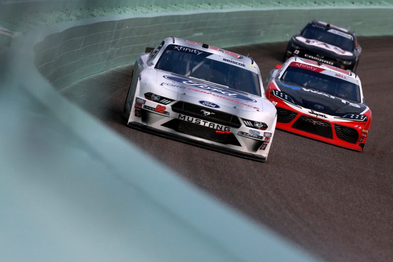 HOMESTEAD, FLORIDA - NOVEMBER 16: Chase Briscoe, driver of the #98 Ford Performance Ford, leads Christopher Bell, driver of the #20 Rheem/Watts Toyota, and John Hunter Nemechek, driver of the #23 Fire Alarm Services Inc. Chevrolet, during the NASCAR Xfinity Series Ford EcoBoost 300 at Homestead-Miami Speedway on November 16, 2019 in Homestead, Florida. (Photo by Sean Gardner/Getty Images) | Getty Images