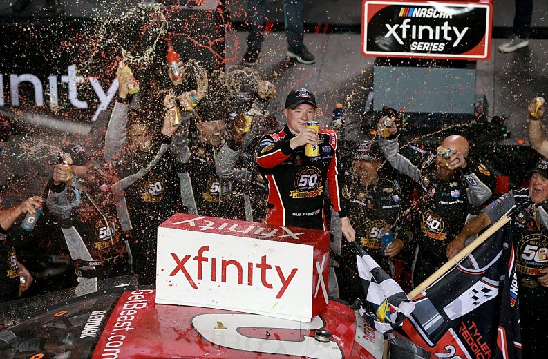 HOMESTEAD, FLORIDA - NOVEMBER 16: Tyler Reddick, driver of the #2 Tame the Beast Chevrolet, celebrates in Victory Lane after winning the NASCAR Xfinity Series Ford EcoBoost 300 and the NASCAR Xfinity Series Championship at Homestead-Miami Speedway on November 16, 2019 in Homestead, Florida. (Photo by Sean Gardner/Getty Images) | Getty Images