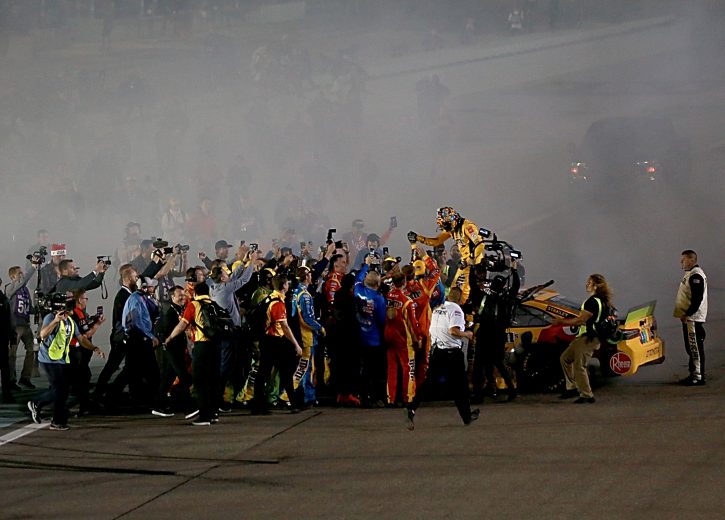 HOMESTEAD, FLORIDA - NOVEMBER 17: Kyle Busch, driver of the #18 M&M's Toyota, celebrates with his crew after winning the Monster Energy NASCAR Cup Series Cahmpionship and  the Monster Energy NASCAR Cup Series Ford EcoBoost 400 at Homestead Speedway on November 17, 2019 in Homestead, Florida. (Photo by Sean Gardner/Getty Images) | Getty Images