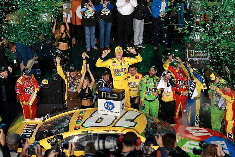 HOMESTEAD, FLORIDA - NOVEMBER 17: Kyle Busch, driver of the #18 M&M's Toyota, celebrates in victory lane after winning the Monster Energy NASCAR Cup Series Championship and the Monster Energy NASCAR Cup Series Ford EcoBoost 400 at Homestead Speedway on November 17, 2019 in Homestead, Florida. (Photo by Sean Gardner/Getty Images) | Getty Images