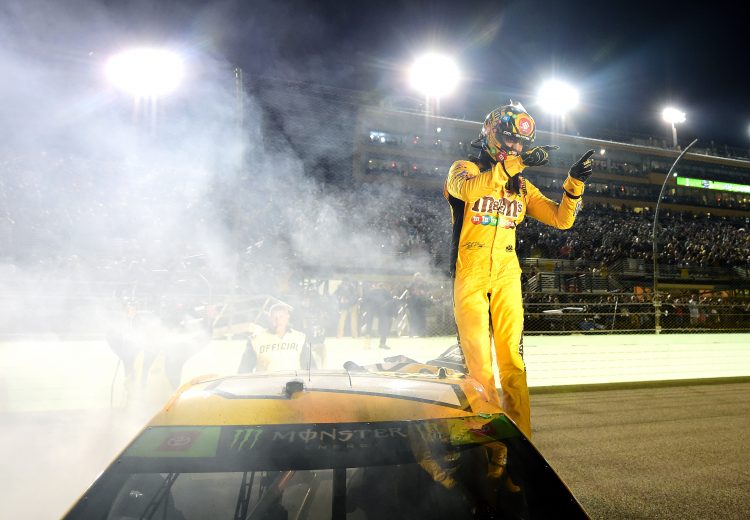 HOMESTEAD, FLORIDA - NOVEMBER 17: Kyle Busch, driver of the #18 M&M's Toyota, celebrates after winning the Monster Energy NASCAR Cup Series Ford EcoBoost 400 and the Monster Energy NASCAR Cup Series Championship at Homestead Speedway on November 17, 2019 in Homestead, Florida. (Photo by Jared C. Tilton/Getty Images) | Getty Images