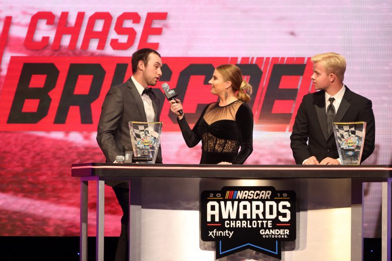 CHARLOTTE, NORTH CAROLINA - NOVEMBER 22: Chase Briscoe(L), NASCAR Xfinity Series Rookie of the Year, and Tyler Ankrum, NASCAR Gander Outdoors Truck Series Rookie of the Year, speak during the NASCAR Xfinity Series and NASCAR Gander Outdoors Truck Series Championship Banquet at Charlotte Convention Center on November 22, 2019 in Charlotte, North Carolina. (Photo by Brian Lawdermilk/Getty Images) | Getty Images