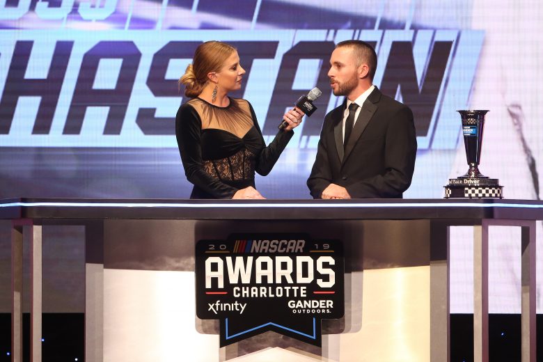 CHARLOTTE, NORTH CAROLINA - NOVEMBER 22: NASCAR driver Ross Chastain speaks as Kaitlyn Vincie looks on during the NASCAR Xfinity Series and NASCAR Gander Outdoors Truck Series Championship Banquet at Charlotte Convention Center on November 22, 2019 in Charlotte, North Carolina. (Photo by Brian Lawdermilk/Getty Images) | Getty Images