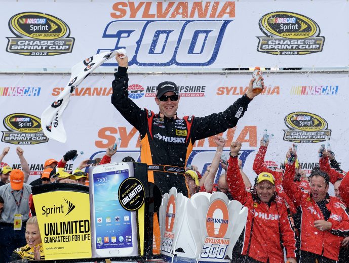 LOUDON, NH - SEPTEMBER 22: Matt Kenseth, driver of the #20 Home Depot/Husky Toyota, celebrates in Victory Lane after wining the NASCAR Sprint Cup Series Sylvania 300 at New Hampshire Motor Speedway on September 22, 2013 in Loudon, New Hampshire. (Photo by Patrick Smith/Getty Images) | Getty Images