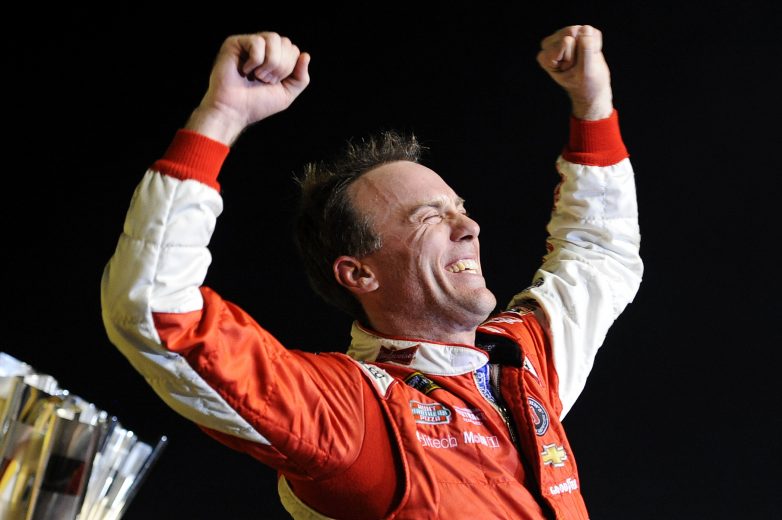 HOMESTEAD, FL - NOVEMBER 16: Kevin Harvick, driver of the #4 Budweiser Chevrolet, celebrates in victory lane after winning the NASCAR Sprint Cup Series Ford EcoBoost 400 at Homestead-Miami Speedway on November 16, 2014 in Homestead, Florida. (Photo by Jared C. Tilton/NASCAR via Getty Images)