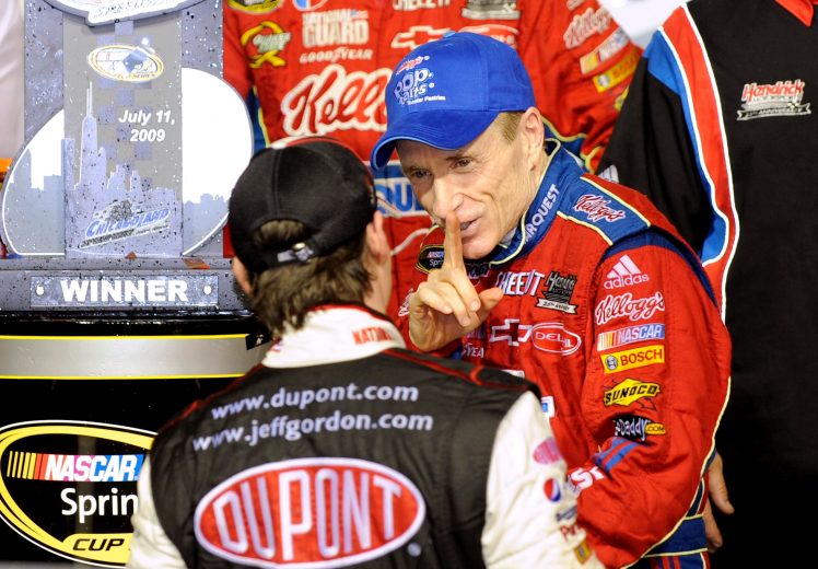 JOLIET, IL - JULY 11: Mark Martin (R), driver of the #5 CARQUEST/Kellogg's Chevrolet, is congratulated by by teammate Jeff Gordon, driver of the #24 National Guard Patriot Academy/DuPont Chevrolet, in victory lane after winning the NASCAR Sprint Cup Series LifeLock.com 400 at Chicagoland Speedway on July 11, 2009 in Joliet, Illinois. (Photo by John Harrelson/Getty Images) | Getty Images