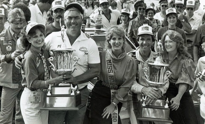 NORTH WILKESBORO, NC - APRIL 18: Darrell Waltrip #11 and crew chief Benny Parsons smile in Victory Lane at North Wilkesboro Speedway. Darrell would take home $32,300 for the win that day. (Photo by: Racing Photo Archives/Getty Images)