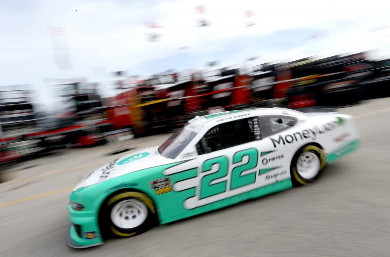 DAYTONA BEACH, FL - FEBRUARY 15: Austin Cindric, driver of the #22 MoneyLion Ford, drives in the garage area during practice for the NASCAR Xfinity Series NASCAR Racing Experience 300 at Daytona International Speedway on February 15, 2019 in Daytona Beach, Florida. (Photo by Brian Lawdermilk/Getty Images) | Getty Images