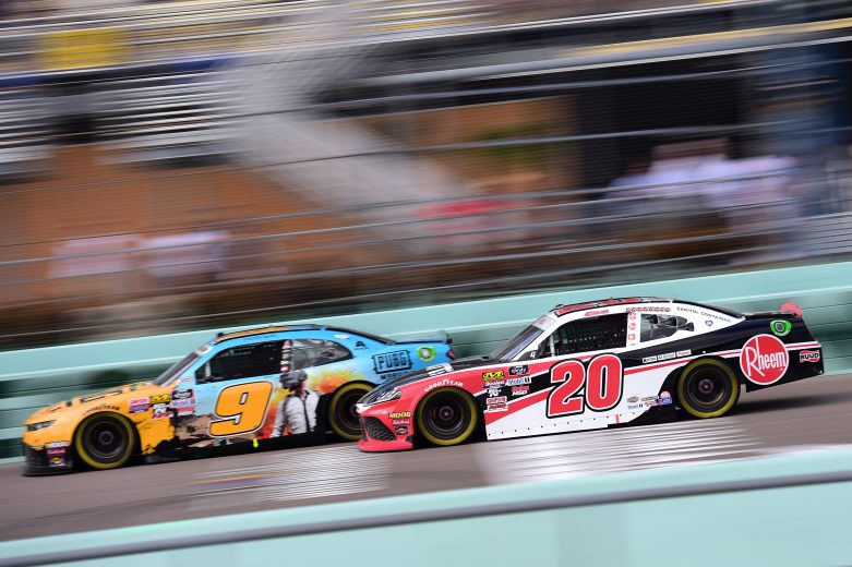 HOMESTEAD, FLORIDA - NOVEMBER 16: Christopher Bell, driver of the #20 Rheem/Watts Toyota, races Noah Gragson, driver of the #9 PUBG MOBILE Chevrolet, during the NASCAR Xfinity Series Ford EcoBoost 300 at Homestead-Miami Speedway on November 16, 2019 in Homestead, Florida. (Photo by Jared C. Tilton/Getty Images) | Getty Images