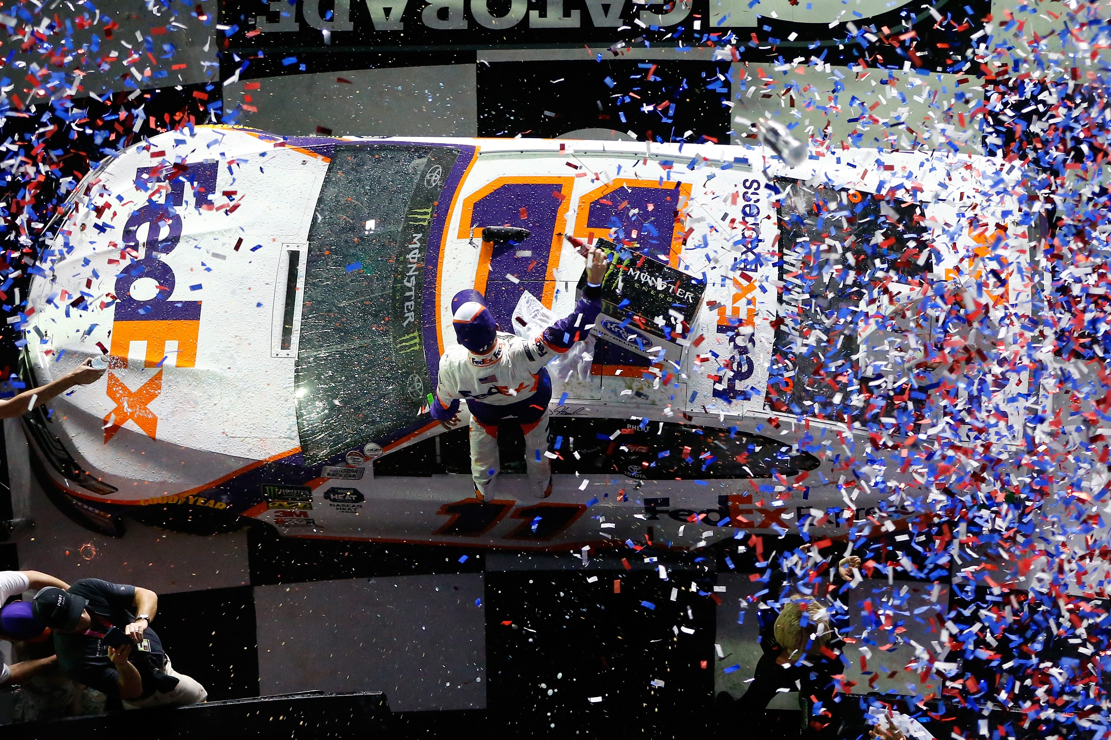 DAYTONA BEACH, FL - FEBRUARY 17:  Denny Hamlin, driver of the #11 FedEx Express Toyota, celebrates in victory lane after winning the Monster Energy NASCAR Cup Series 61st Annual Daytona 500 at Daytona International Speedway on February 17, 2019 in Daytona Beach, Florida.  (Photo by Jonathan Ferrey/Getty Images) | Getty Images