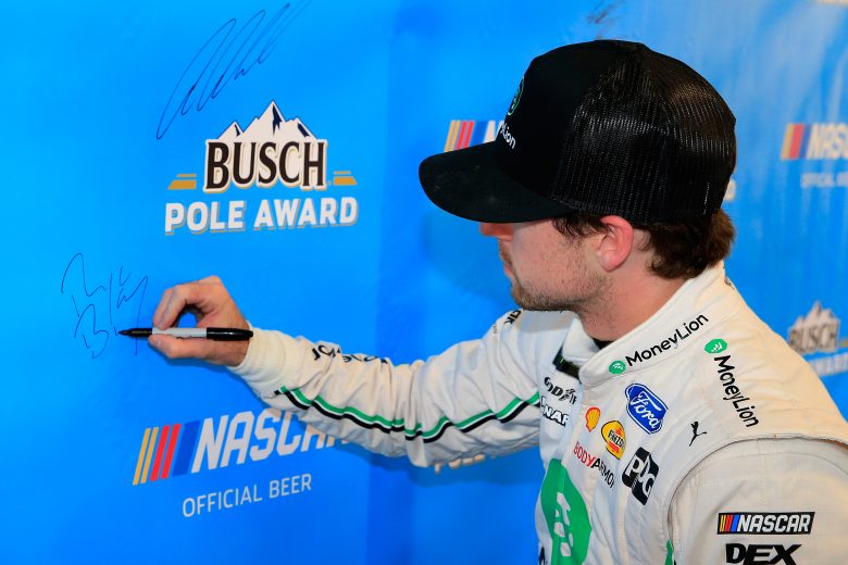 AVONDALE, AZ - MARCH 08:  Ryan Blaney, driver of the #12 MoneyLion Ford, signs the Busch Pole Award backdrop after qualifying for the pole position for the Monster Energy NASCAR Cup Series TicketGuardian 500 at ISM Raceway on March 8, 2019 in Avondale, Arizona.  (Photo by Daniel Shirey/Getty Images) | Getty Images