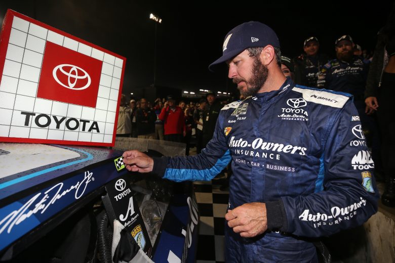 RICHMOND, VA - APRIL 13:  Martin Truex Jr, driver of the #19 Auto Owners Insurance Toyota, poses with the winners sticker after the Monster Energy NASCAR Cup Series Toyota Owners 400 at Richmond Raceway on April 13, 2019 in Richmond, Virginia.  (Photo by Matt Sullivan/Getty Images) | Getty Images