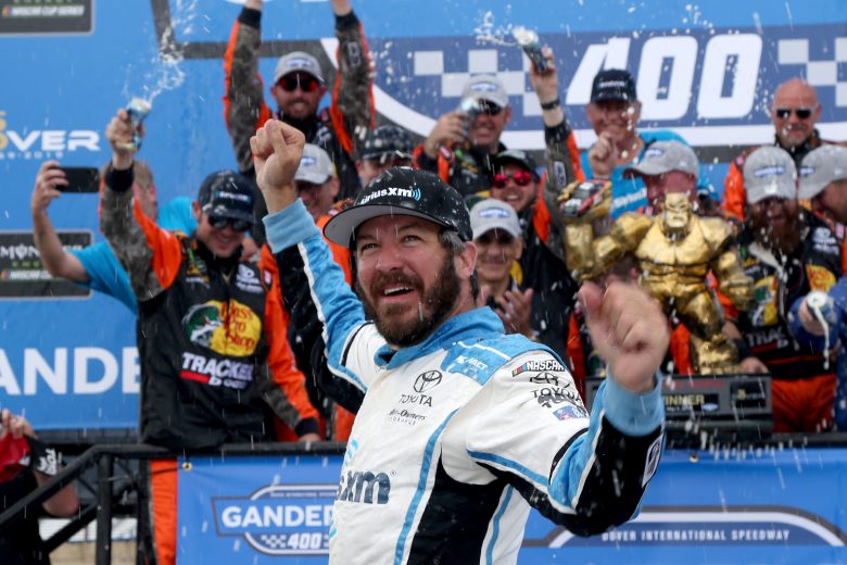 DOVER, DE - MAY 06:  Martin Truex Jr., driver of the #19 SiriusXM Toyota, celebrates in Victory Lane after winning the Monster Energy NASCAR Cup Series Gander RV 400 at Dover International Speedway on May 6, 2019 in Dover, Delaware.  (Photo by Matt Sullivan/Getty Images) | Getty Images